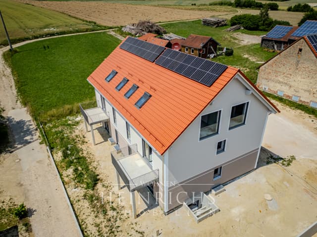 Moderne Erdgeschosswohnung mit Terrasse, Gartenanteil und vielseitigem Untergeschoss